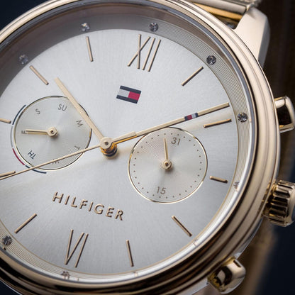 Close-up shot of the gold dial and mesh strap on Tommy Hilfiger 1782302 women’s watch