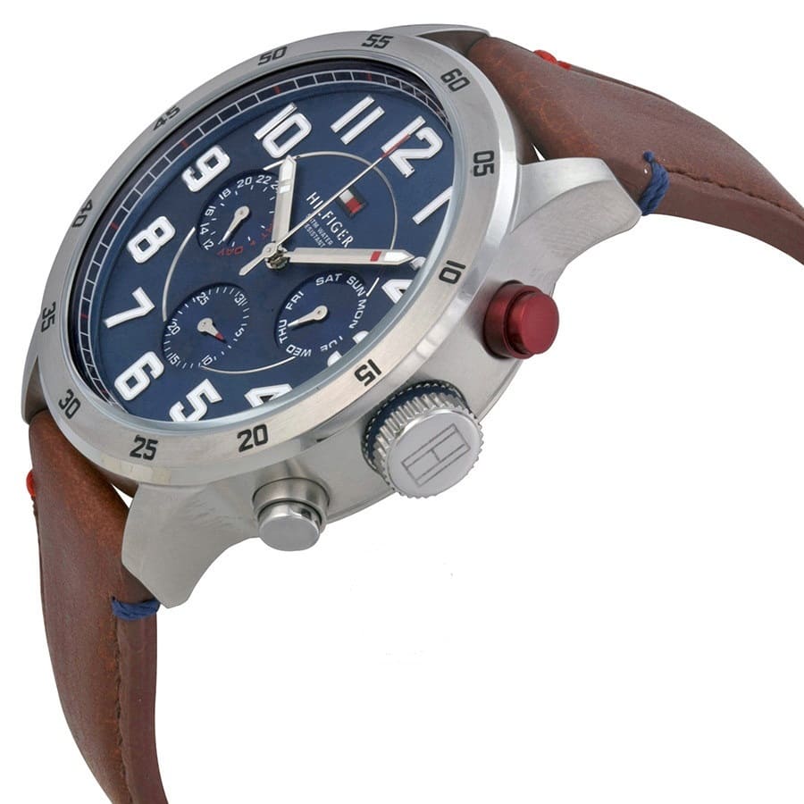 Close-up of Tommy Hilfiger 1791066 men’s watch with detailed blue dial and brown leather strap.