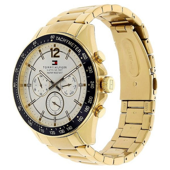 Close-up of white dial on Tommy Hilfiger 1791121 with gold case and detailing