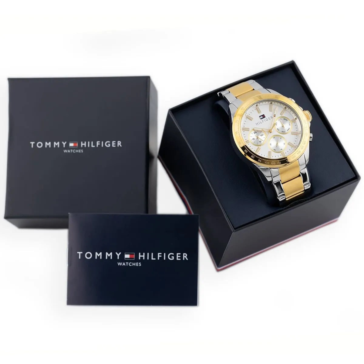 Tommy Hilfiger 1791226 men's watch displayed with original branded box and instruction manual