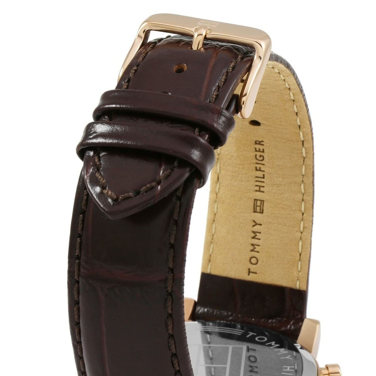Brown leather strap detail on Tommy Hilfiger 1791399 gold case men's watch