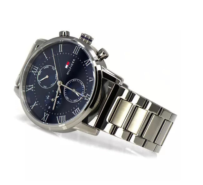 Angled view of Tommy Hilfiger 1791456 showing blue dial and grey strap