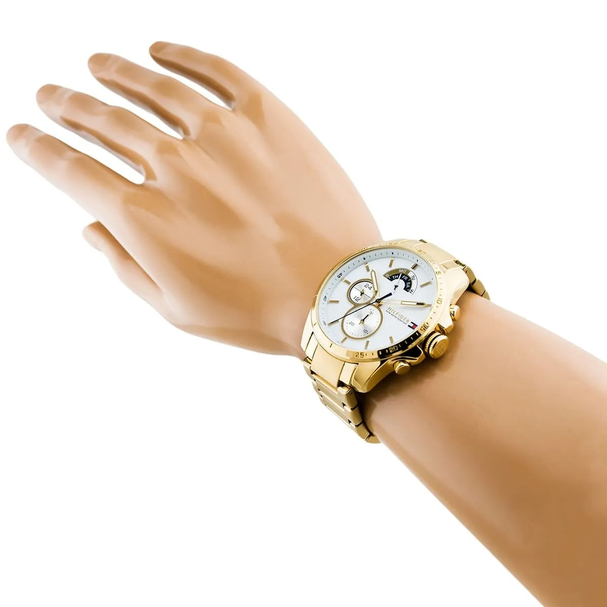 Tommy Hilfiger 1791538 gold men's watch worn on wrist with white dial