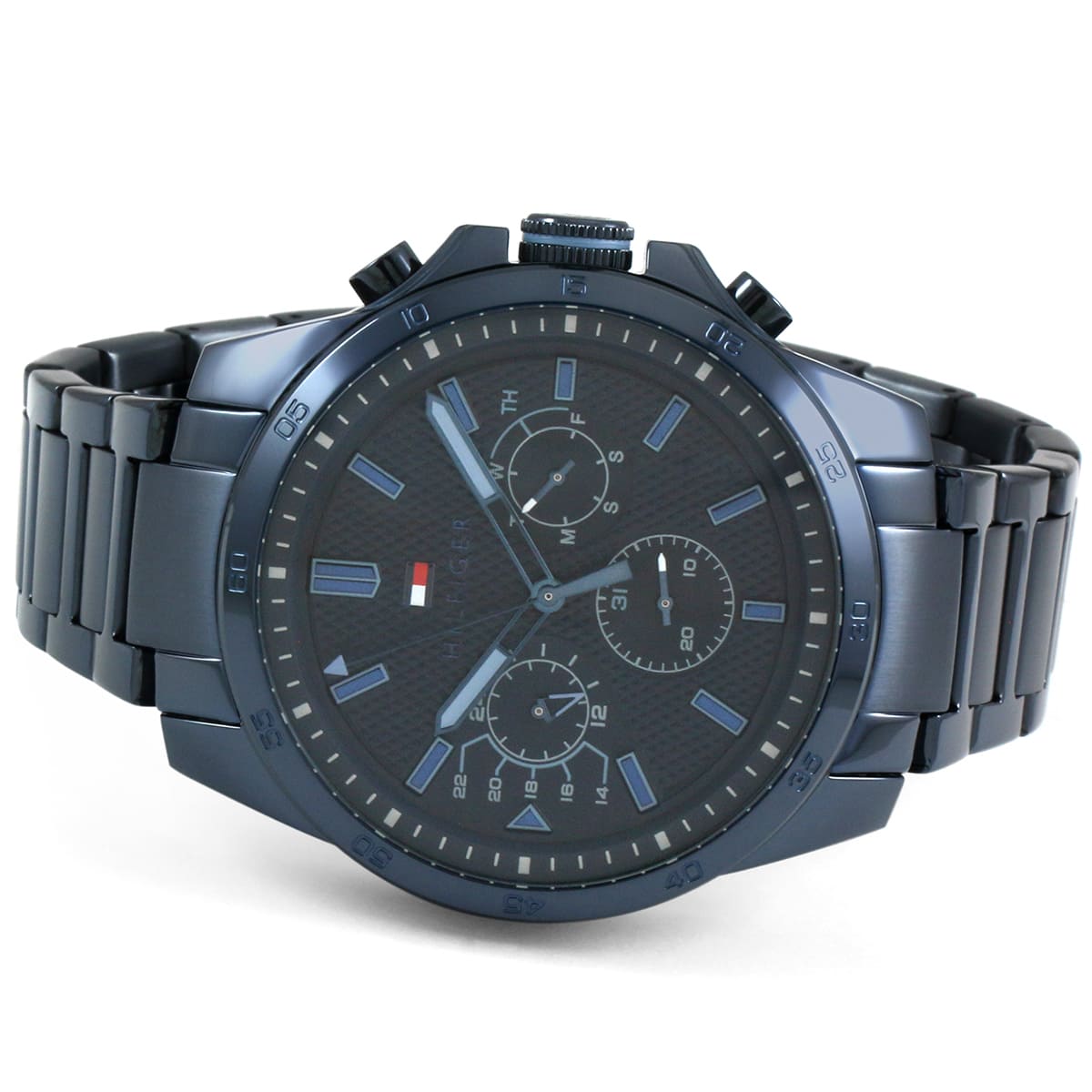 Close-up of Tommy Hilfiger 1791560 blue dial with brand logo and hour markers
