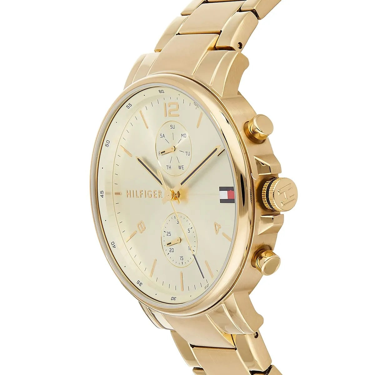 Side profile of the Tommy Hilfiger Daniel gold watch showing the case thickness, textured crown, and chronograph-style pushers.