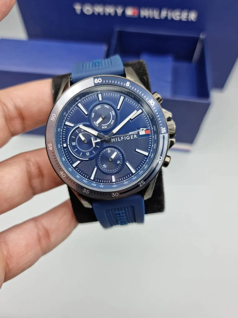 Front view of Tommy Hilfiger men’s watch 1791721 with blue dial and silicone strap