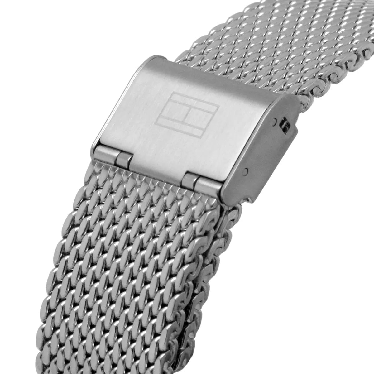 Detailed close-up of the silver-tone sliding clasp on the Tommy Hilfiger mesh bracelet featuring the signature flag logo.