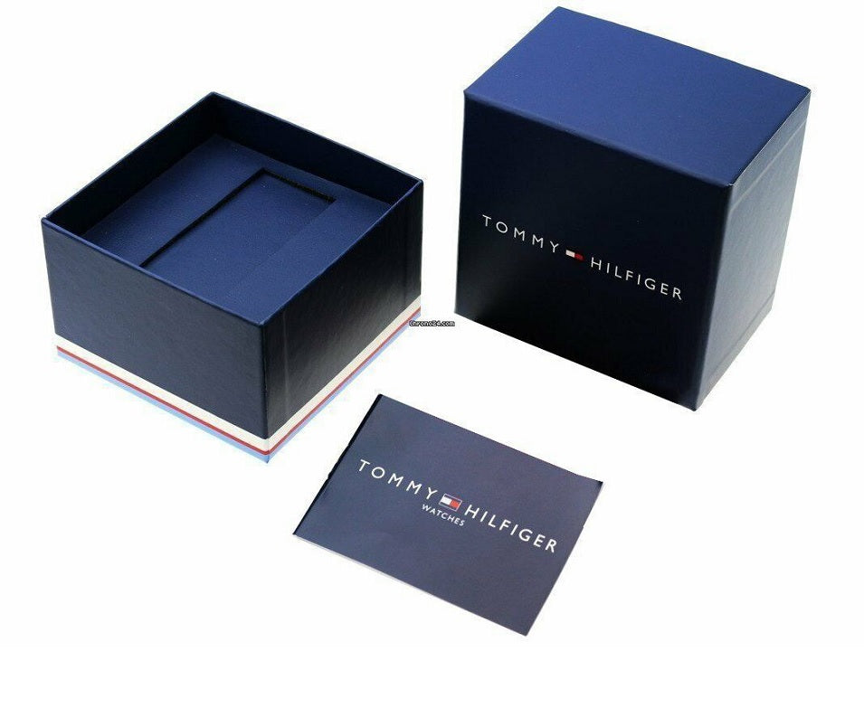 Open Tommy Hilfiger watch box with watch inside, showing interior design